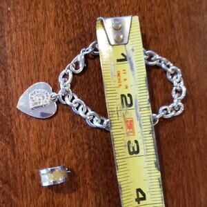 Small bracelet with heart and‎ one stud earing letter G